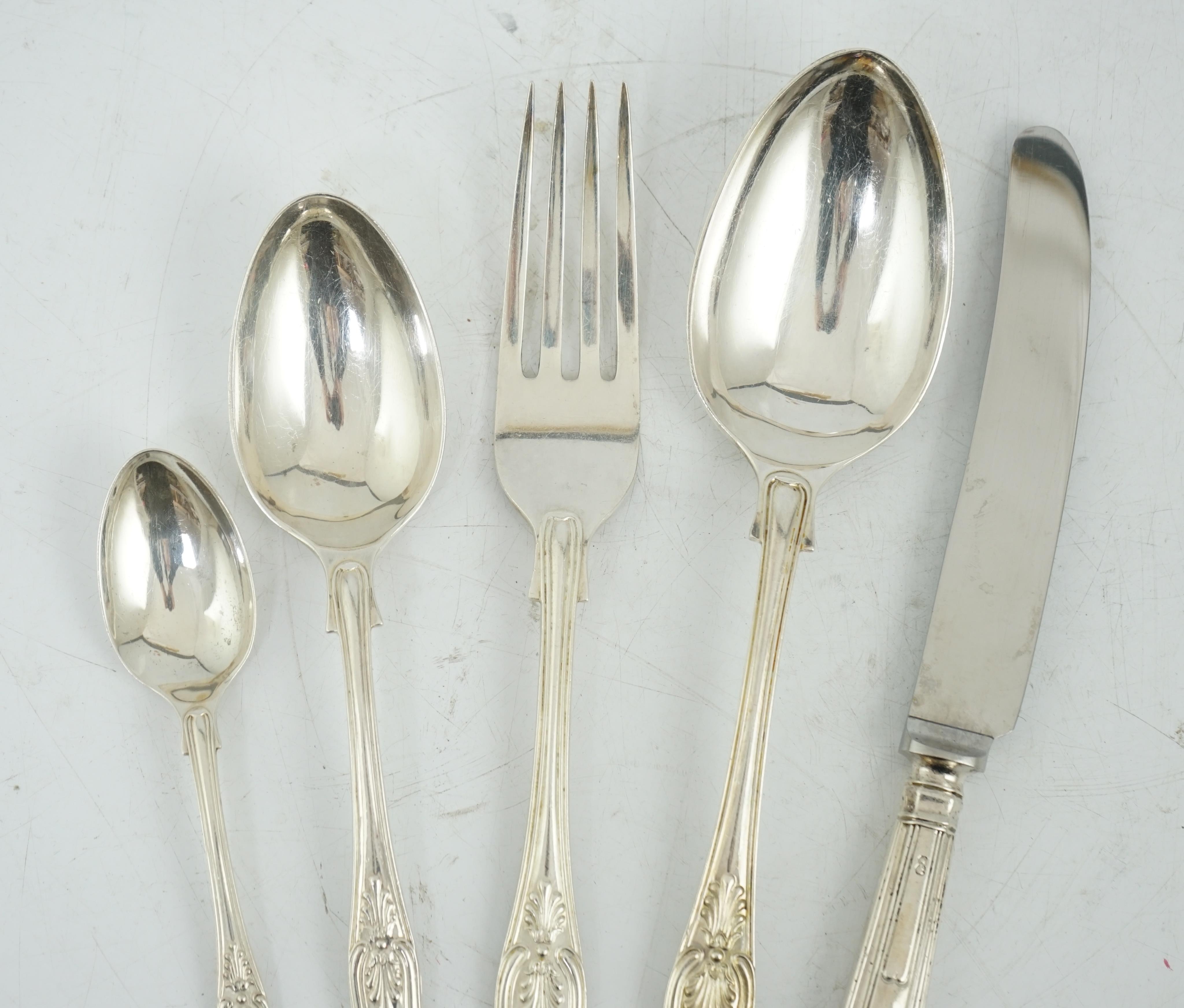 An Elizabeth II canteen of silver King's pattern cutlery for twelve by Garrard & Co Ltd